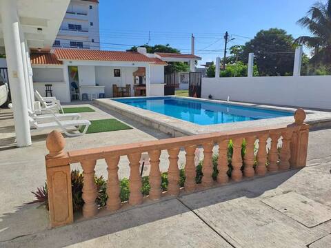 Beach house with pool one block from the sea.