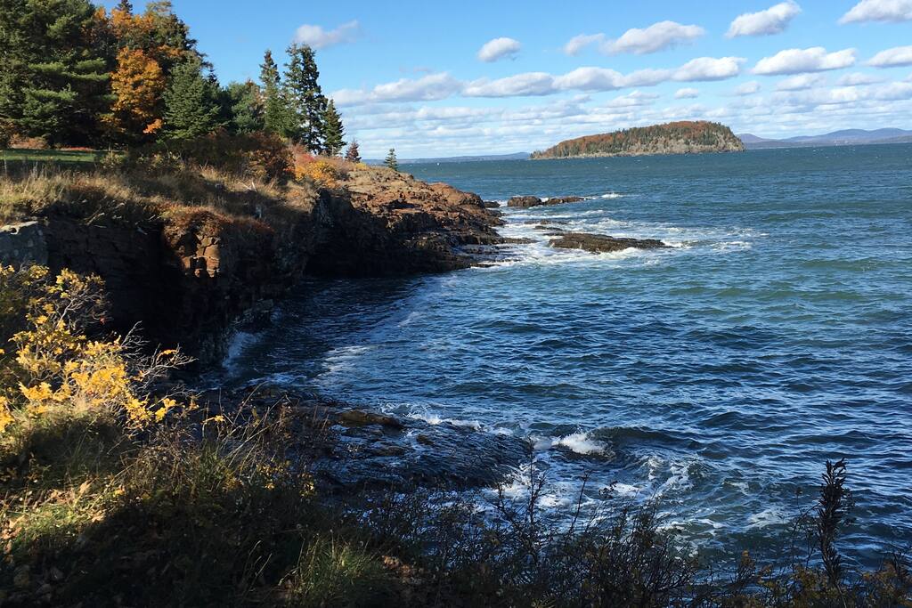Private rock beach with sweeping views.