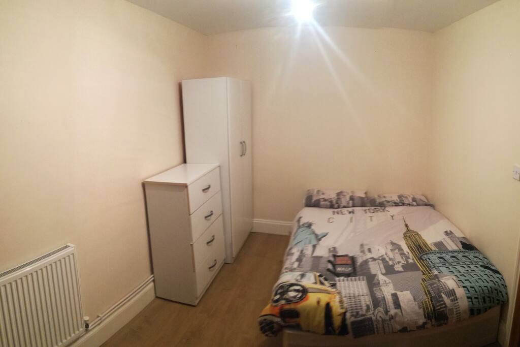 spacious and warm modern doubleroom with laminated floor