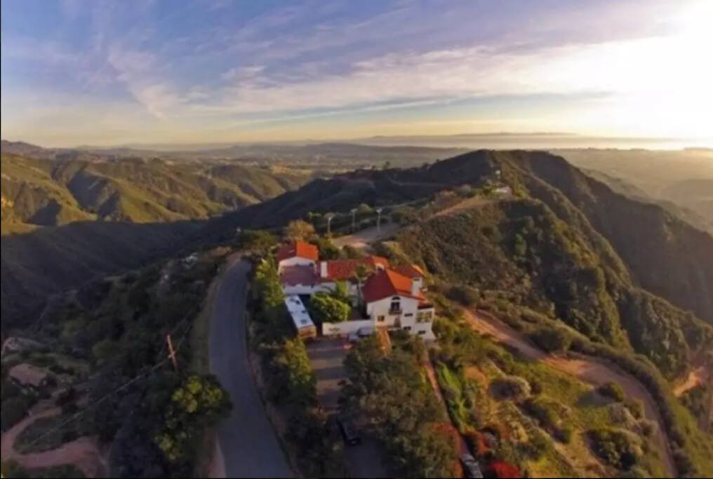 Above it all, yet just 6 min down the hill, 10 to Whole Foods or Trader Joe's and 15 to the airport, downtown or beaches. Plus only 20-25 min to Solvang/Los Olivos