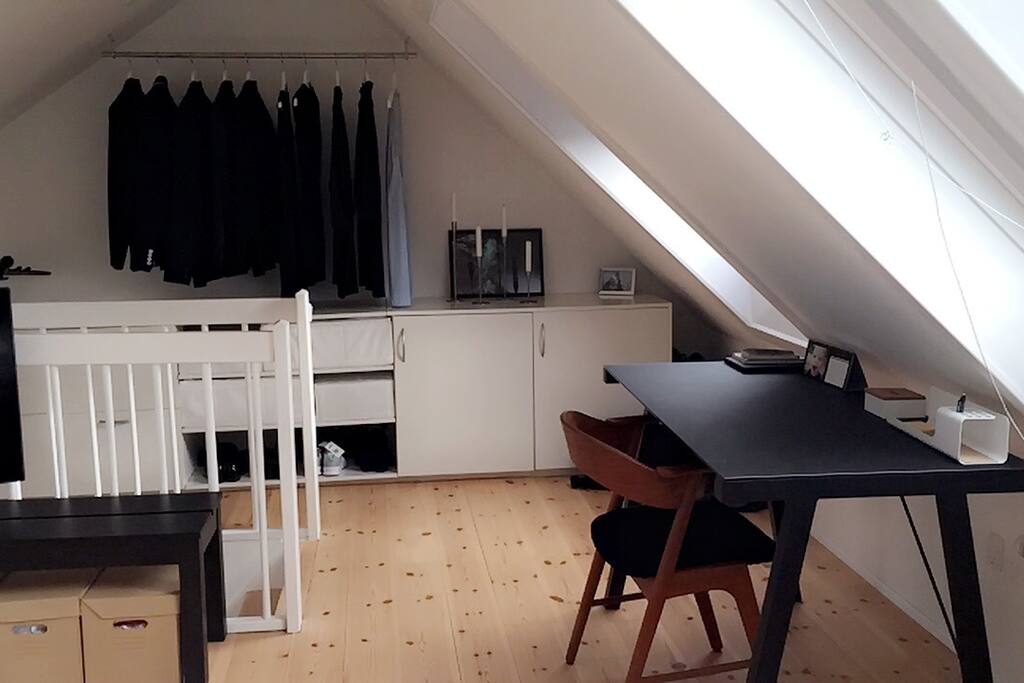 Upstairs working space in bedroom (TV to the left)