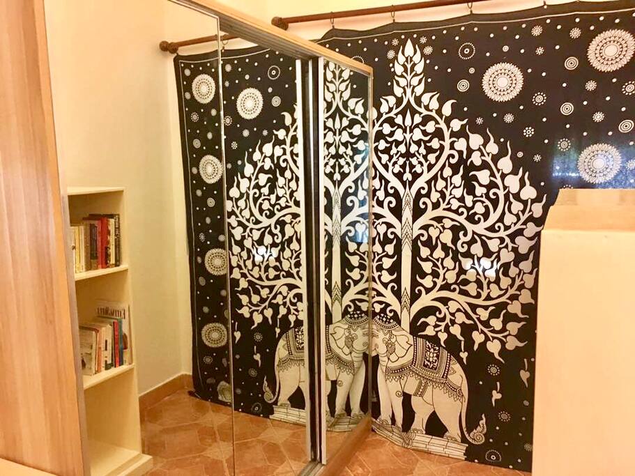 Wardrobe with sliding mirror doors, bookshelf