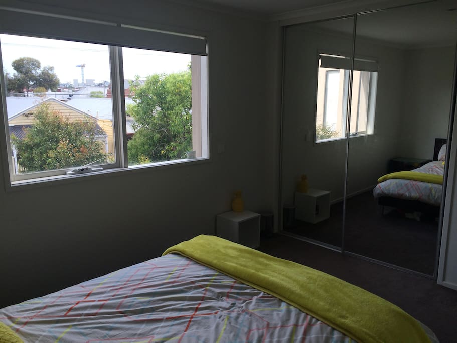 Mirrored closet doors, wardrobe space available if needed. Electric blinds/shade