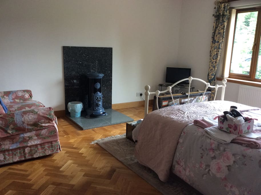 Large bedroom with private ensuite bathroom, double bed,Freeview t.v. and cozy sitting area