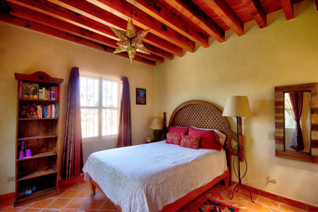 Your room with private bath, high end mattress, quality sheets, purified water, coffeemaker and small fridge in room. Also a Private Terrace on third level.