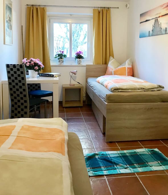 Schlafzimmer mit Einzelbetten