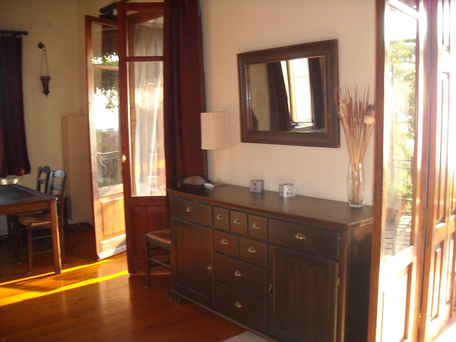 Two sets of doors open onto the balcony