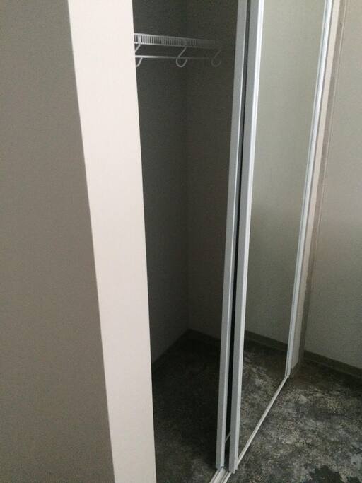 Full Size closet with Sliding mirror doors