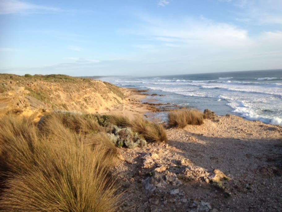 15 minute walk through national park to back beach
