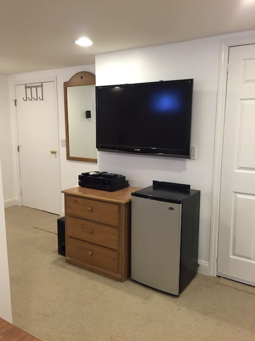 large 47" flat screen TV and mini fridge