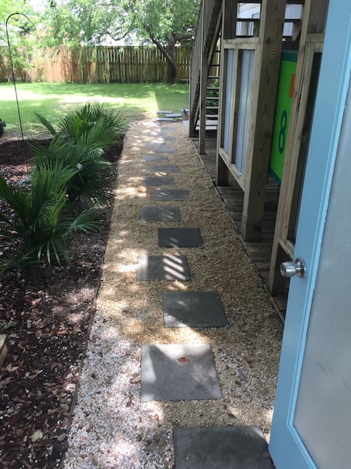 Entry to the backyard and stairs to the living area