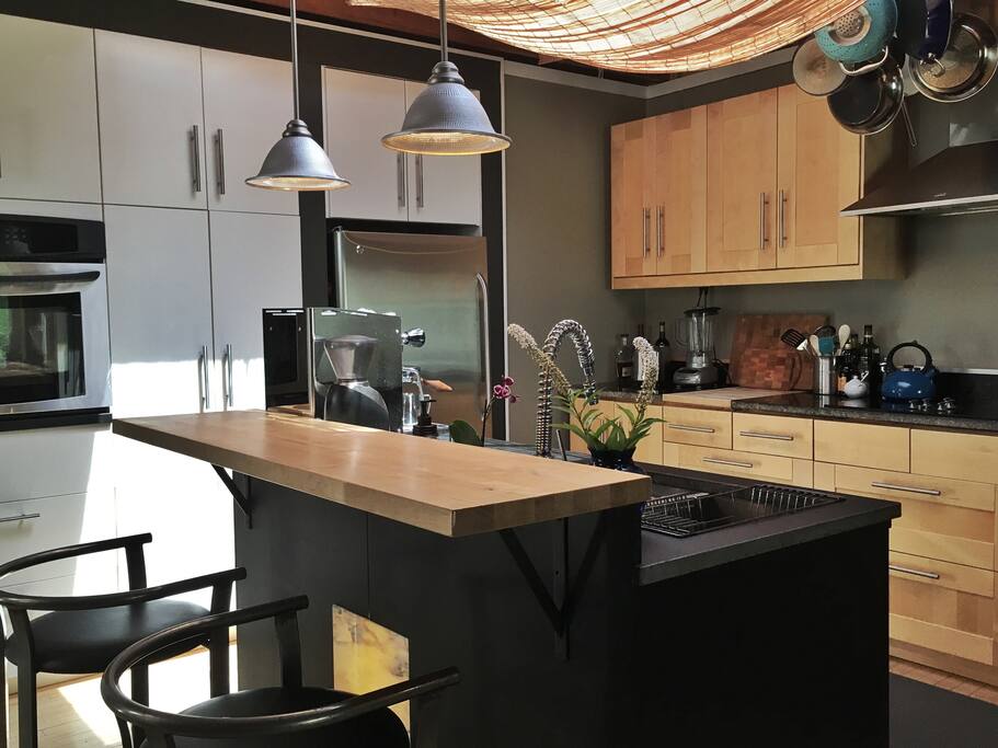 A great kitchen with a large overhead skylight.