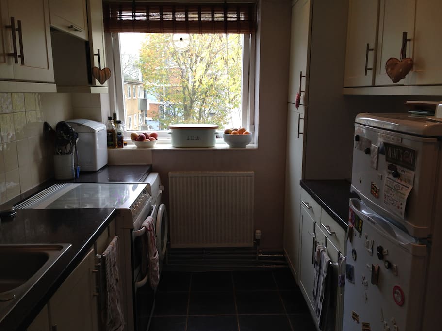 Gas cooker, washing machine, fridge freezer, toaster, kettle and all usual kitchen utensils