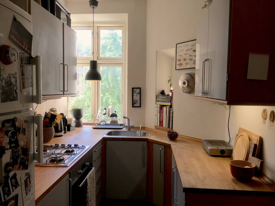 This is the kitchen. Don't let the size fool you - we have hosted dinner parties for more than 14 people at a time, and this baby's got everything!