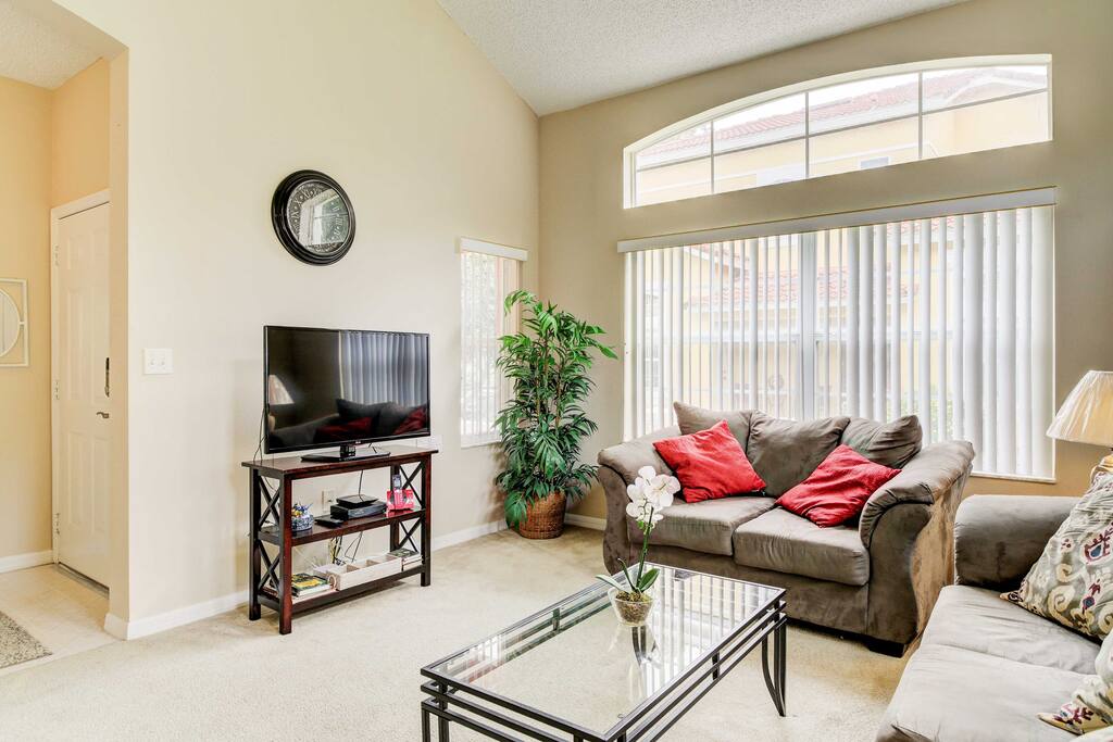 Stay entertained watching the flat-screen cable TV in the living room.