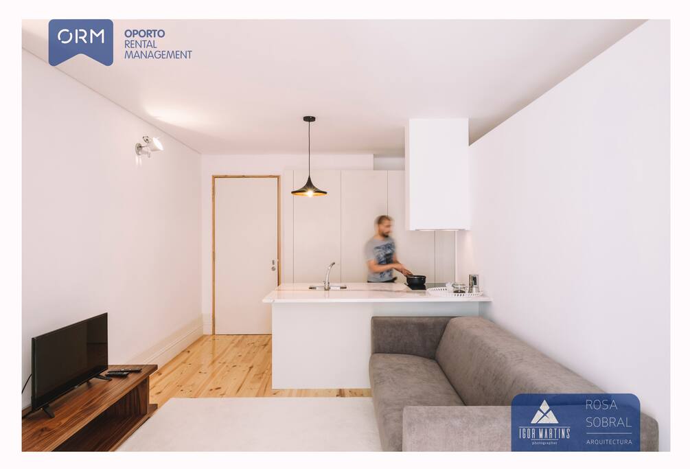 Kitchen + Living room with double sofa bed and terrace