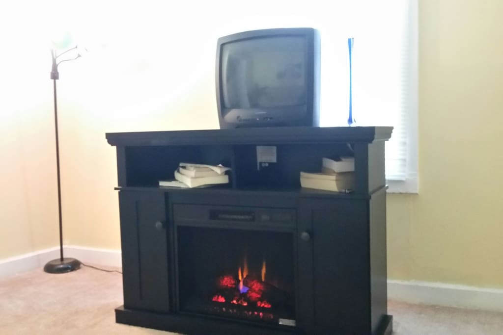 See our upgrades living room for guests. Room heating electric fireplace. A great way to relax on your trip.