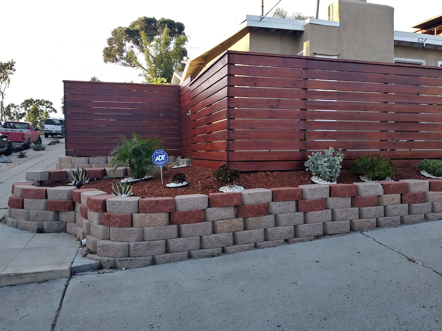 Side view of the house from the street, fence provided some privacy.
