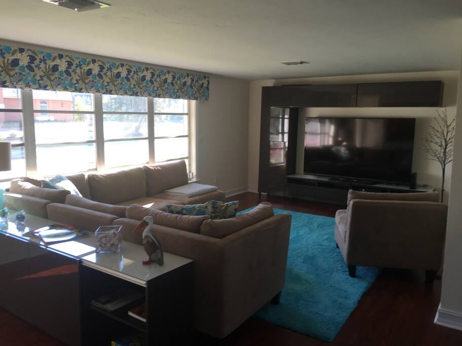 Large but cozy family room with 80" hi def TV