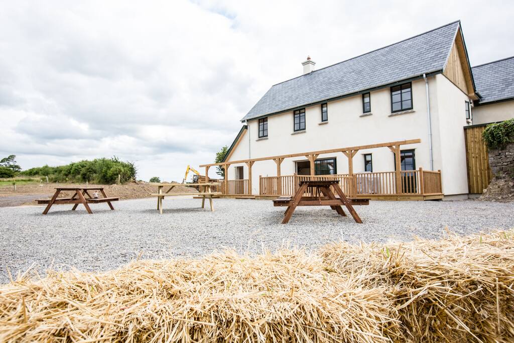The Lime House (Strawbale Eco-lodge) with additional showers, toilets, kitchen and dining facilities for the Winter season.