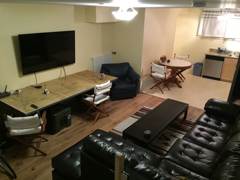 60" TV with Apple TV, netflix, HBO, ESPN, etc.