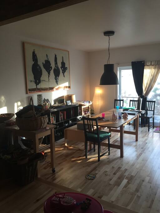 Large dining room table sits 8 people easily (next to kitchen, living room and backyard)
