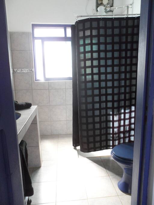 Large bathroom shared with one other guest.
