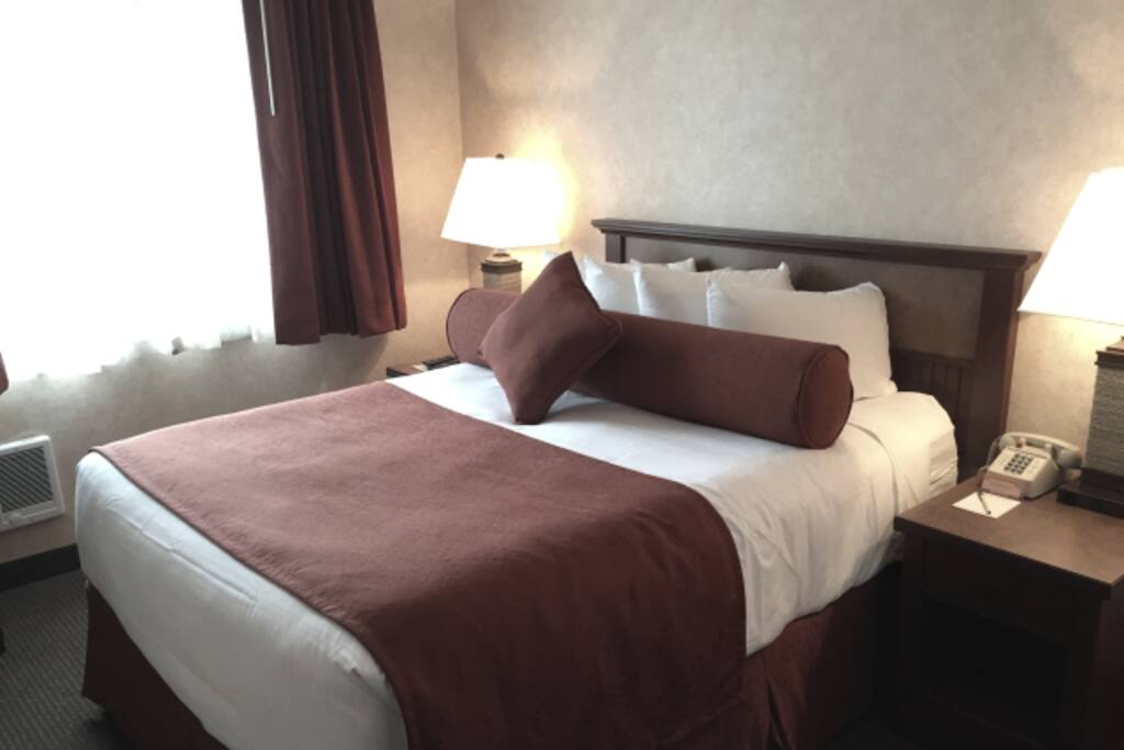 Queen bed in room