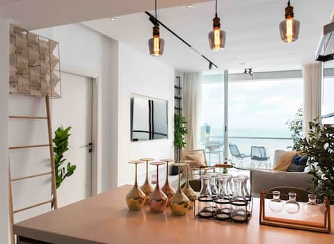 DAMAC Corniche Tower with a view of the sea