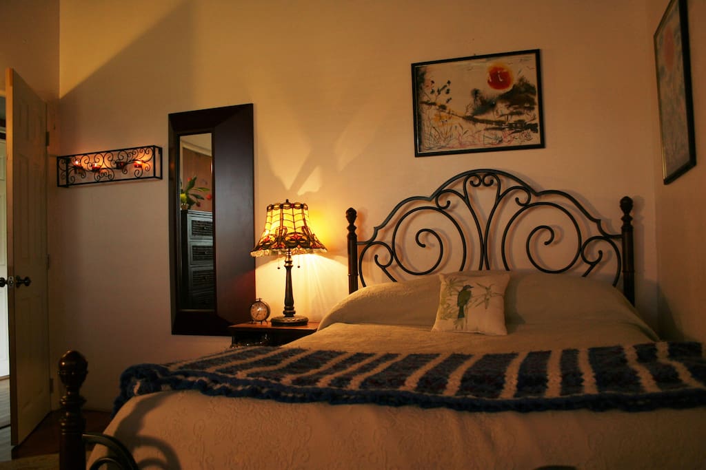 bedroom wall side w/ nice opposing window & pleasant view on other side