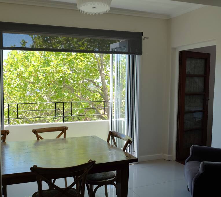 Dining/working area with views of Lions Head, Signal Hill and Cape Town CBD.