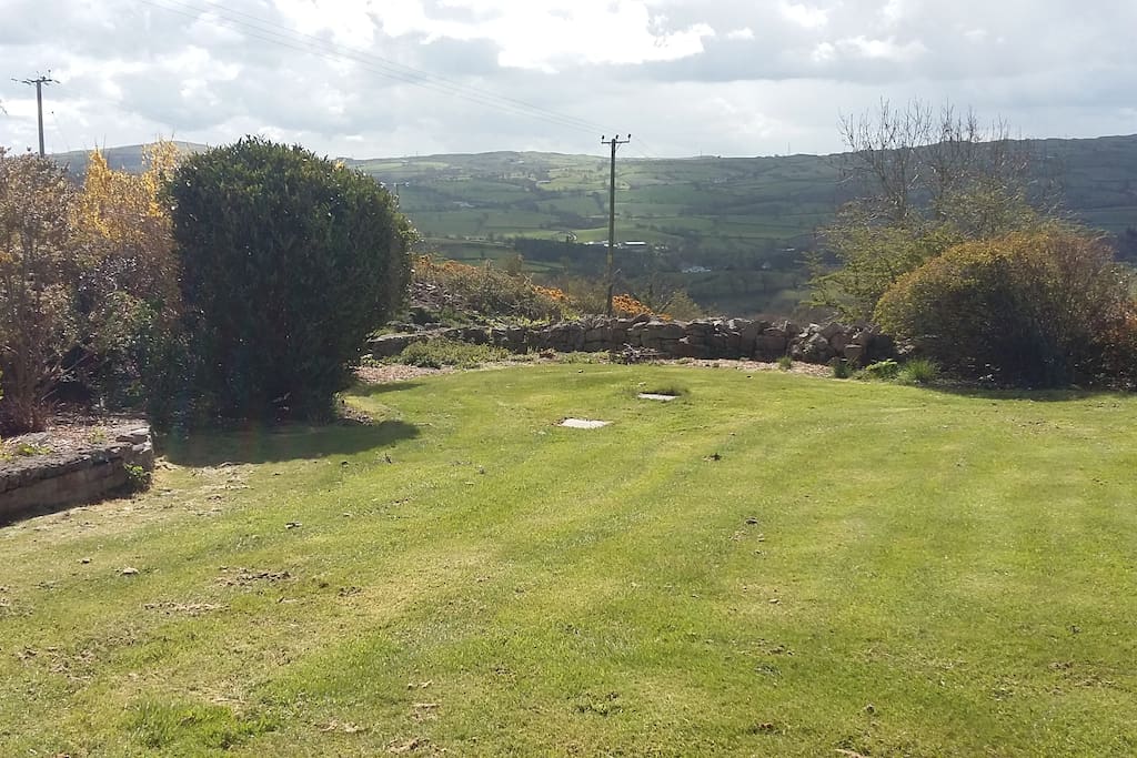 Garden and rolling hills of Rhyd y Foel