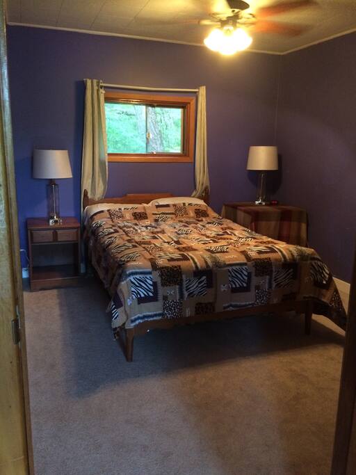 The purple room has new carpet and ceiling fan for hot nights.