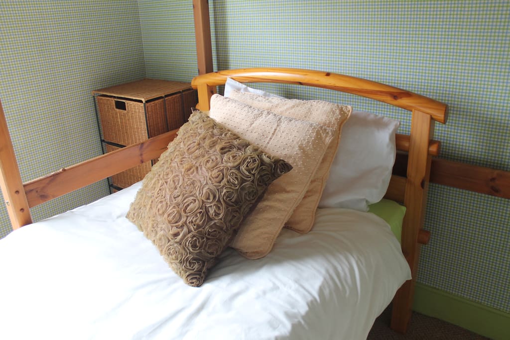 Very comfortable single bed with upper bunk also available.
