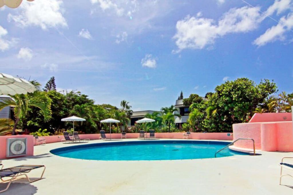 Adjacent pool, steps from condo