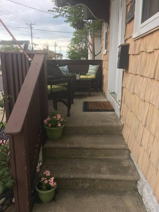 Stairs up to the front porch/front door