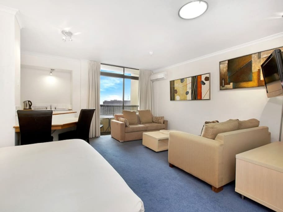 Small balcony, to the rear of the building, quiet and with a partial view to the harbour.