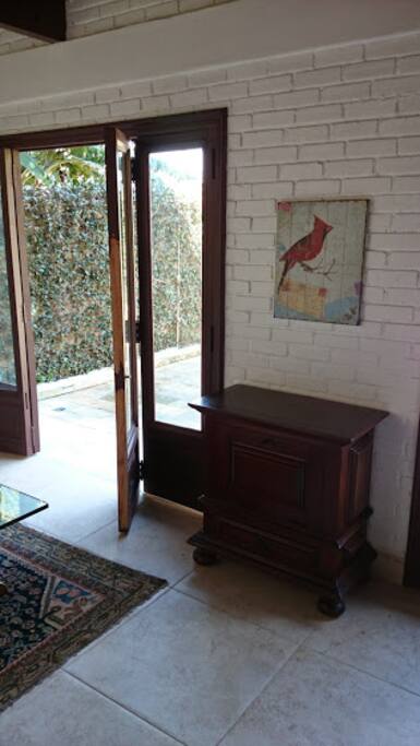 livig room opens to the pool area