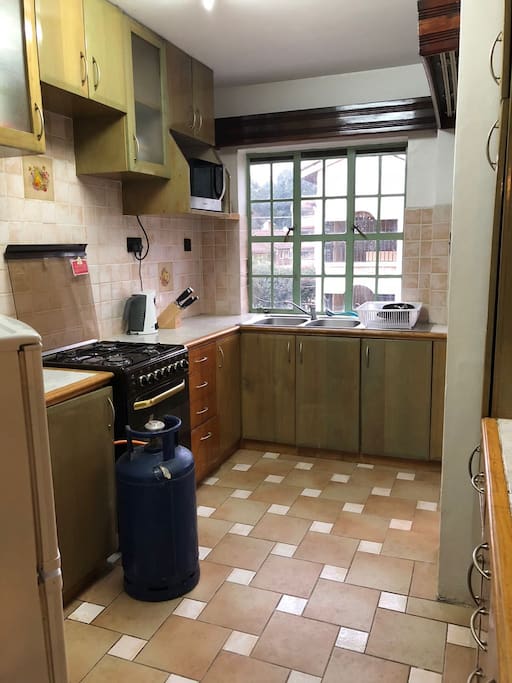 Kitchen with a range of appliances.