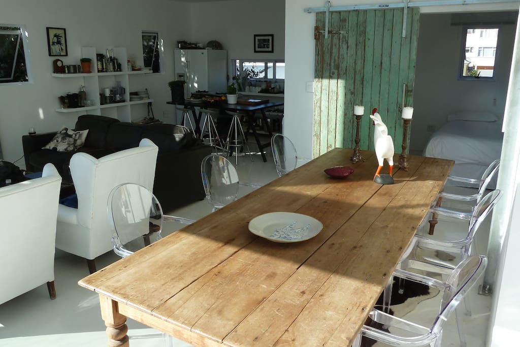 Open plan dining and lounge area double volume