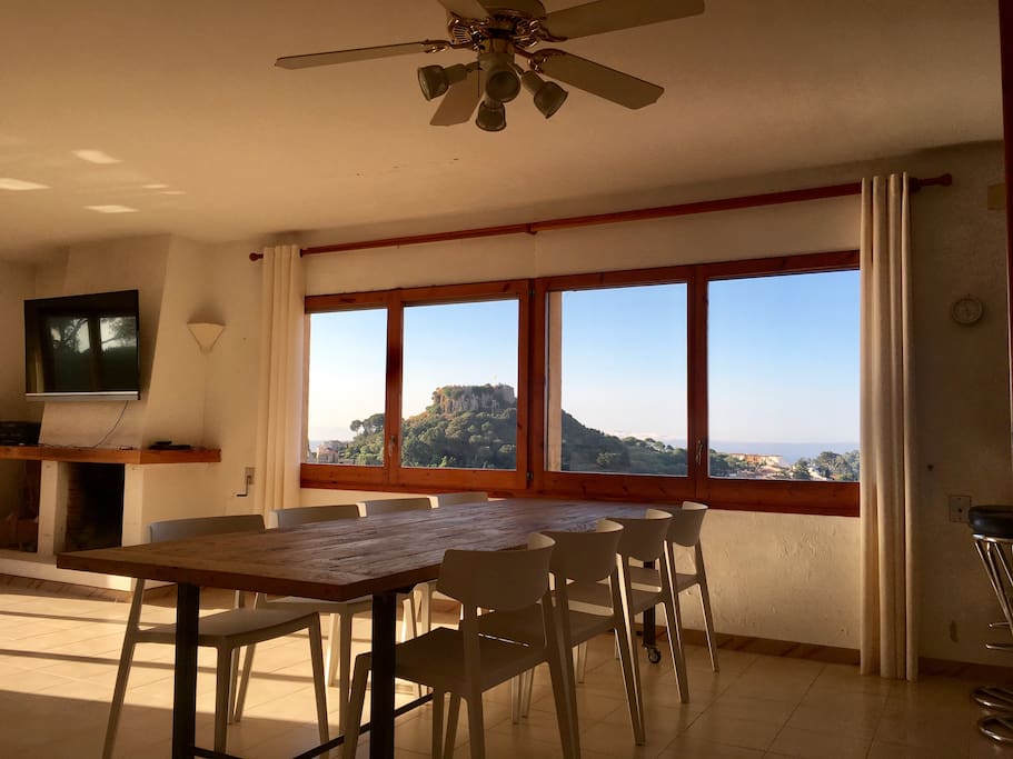 Aged oak dining dining table with 10 chairs - views towards the Begur Castle and Meditarenean sea