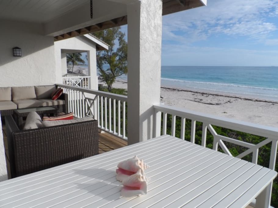 View of outdoor sitting area from dining table.
