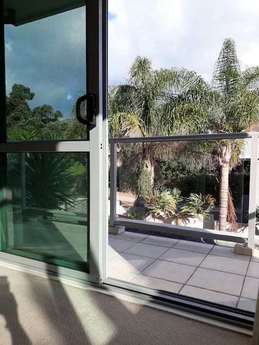 At home by the sea. Peace, palms and privacy - private deck off bedroom