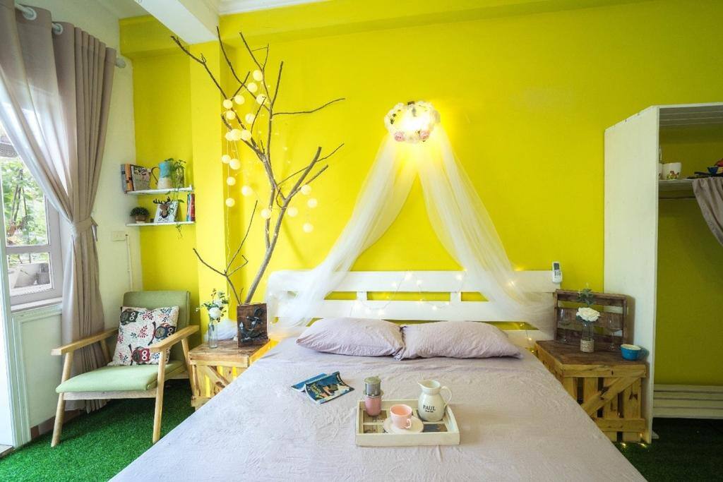 Bedroom on the third floor with balcony overlooking West Lake