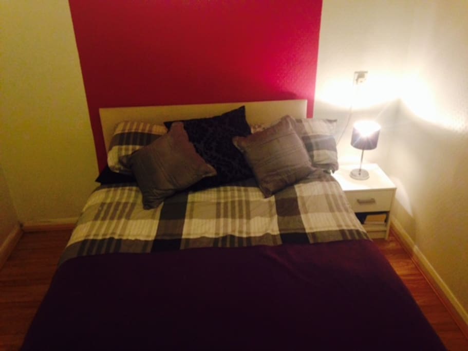 Large double bedroom with lots of storage