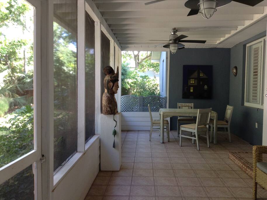 Large porch with view of garden is a good spot for sketching or painting.