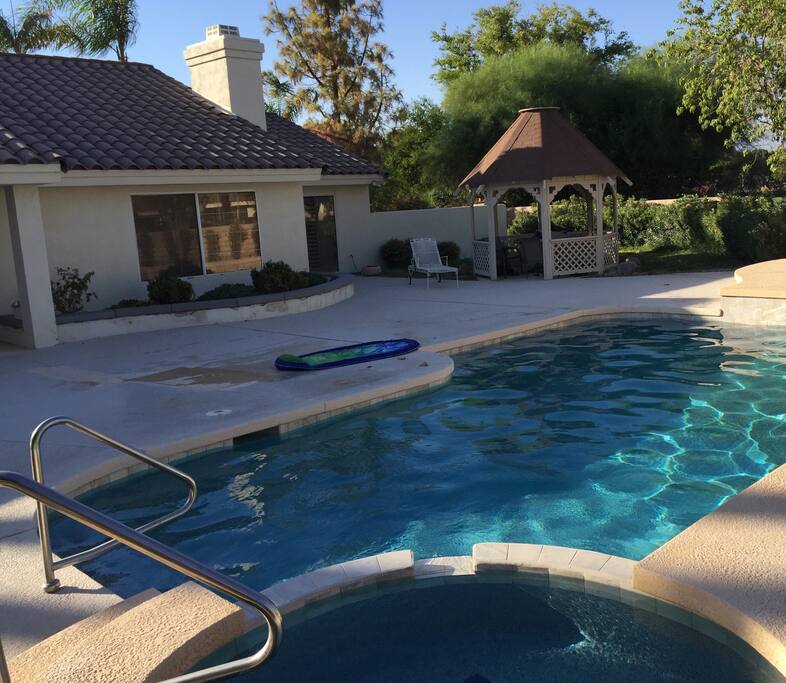 Enjoy outdoor living with private pool, spa, dinning area and gazebo.