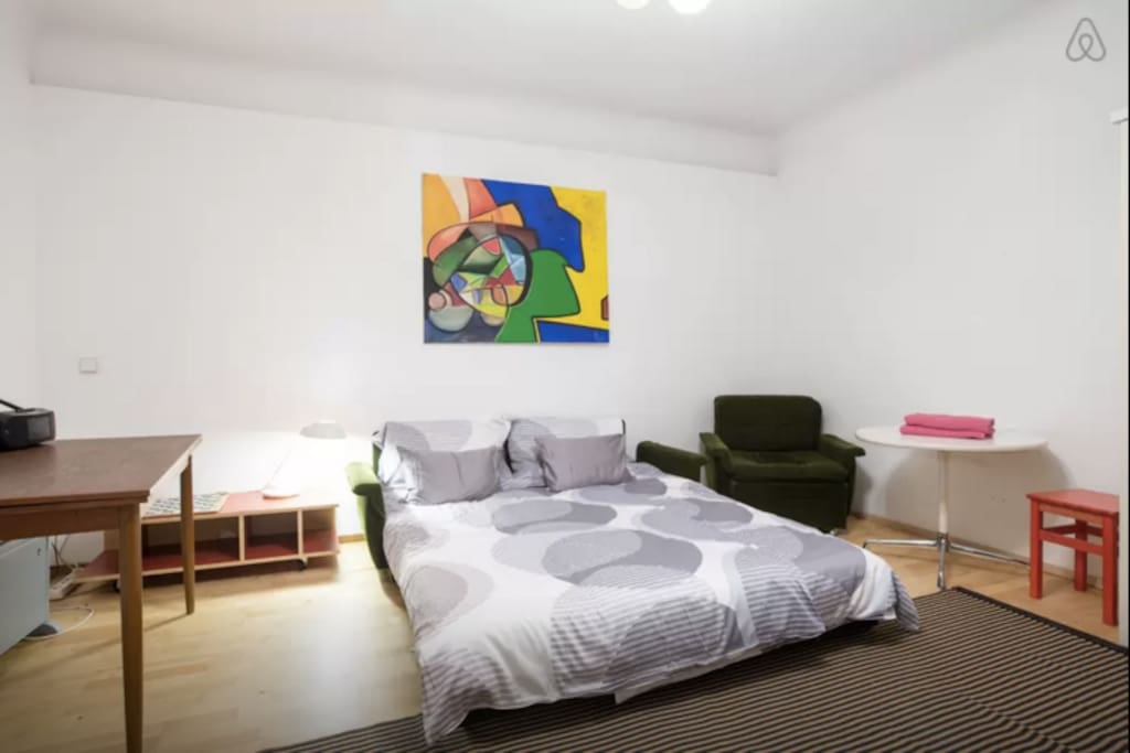 queen size bed in the bedroom and queen size sofa bed for two people