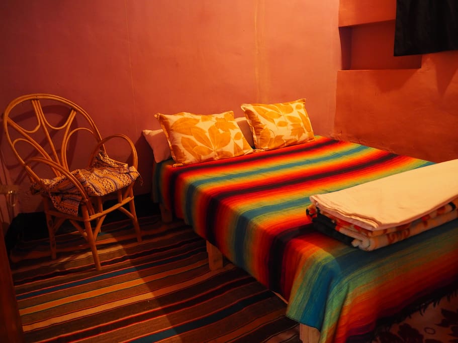 Our double bedroom. All our rooms are simple but comfortable.