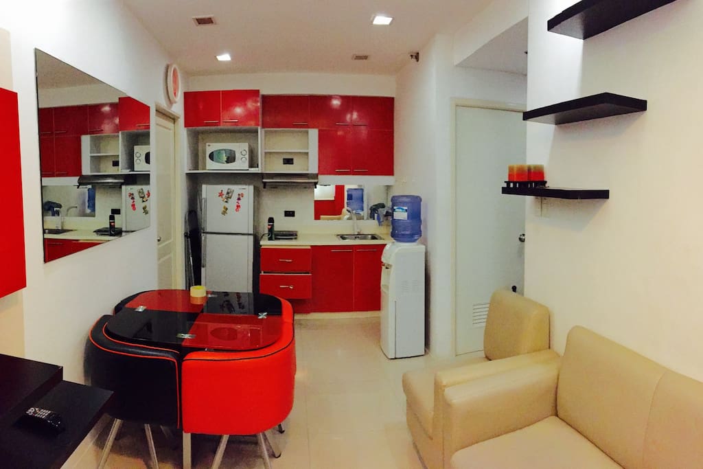 Refrigerator/freezer, microwave oven, induction cooker, range hood, kitchen cabinets, water dispenser